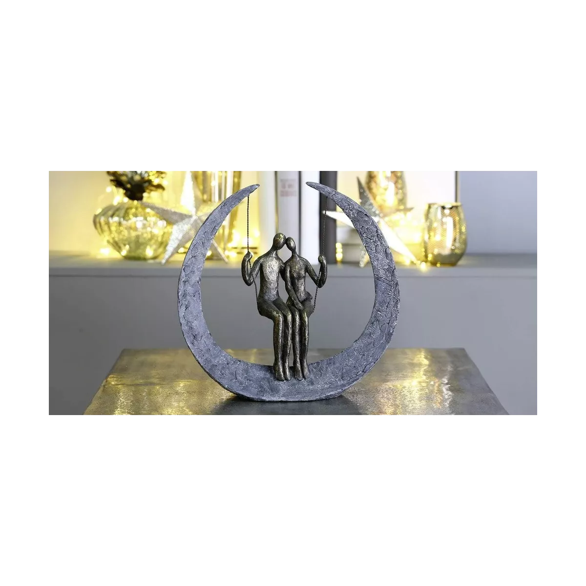 Sculpture couple sur balancoire H.30cm