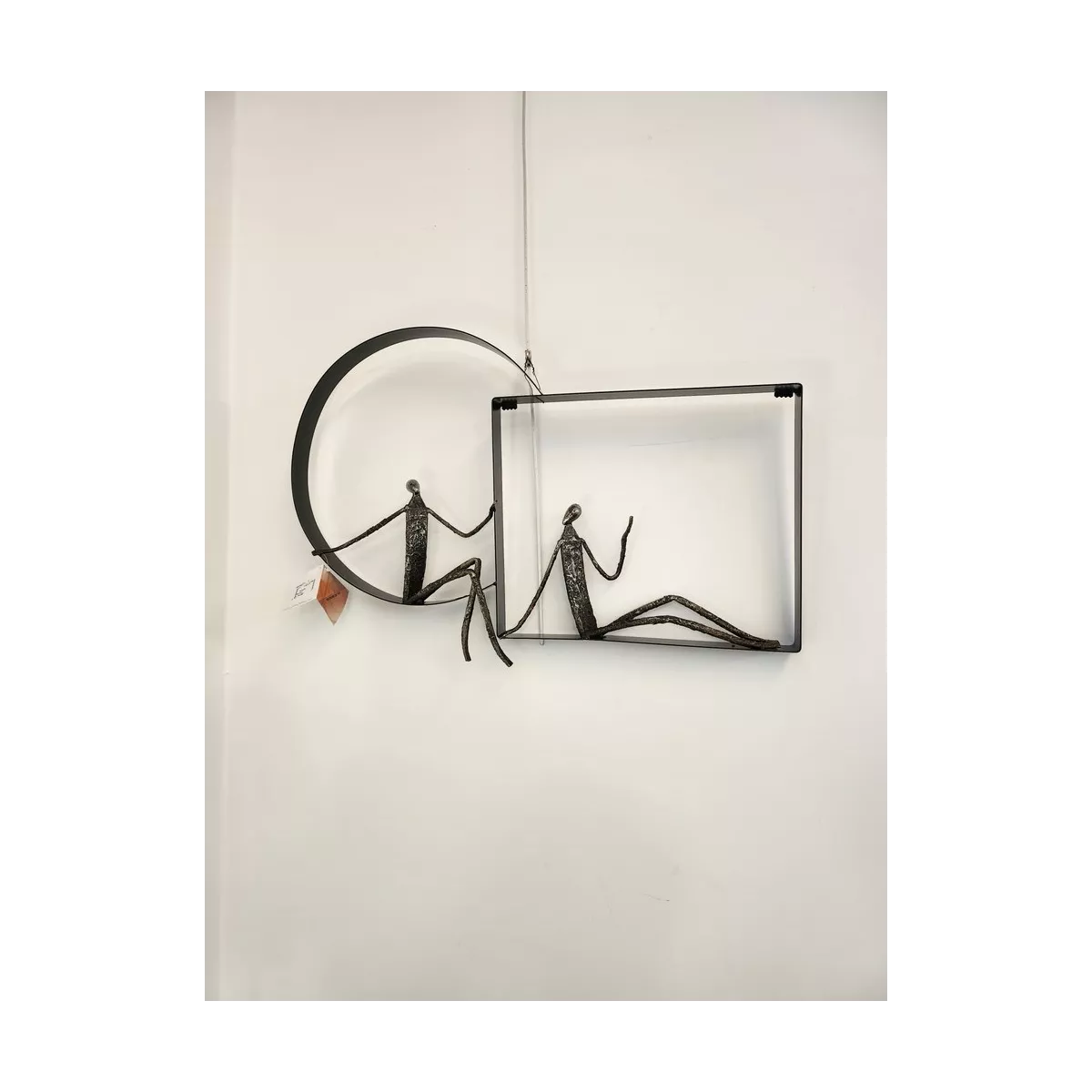 Sculpture murale 2 personnages en aluminuim dans cercles