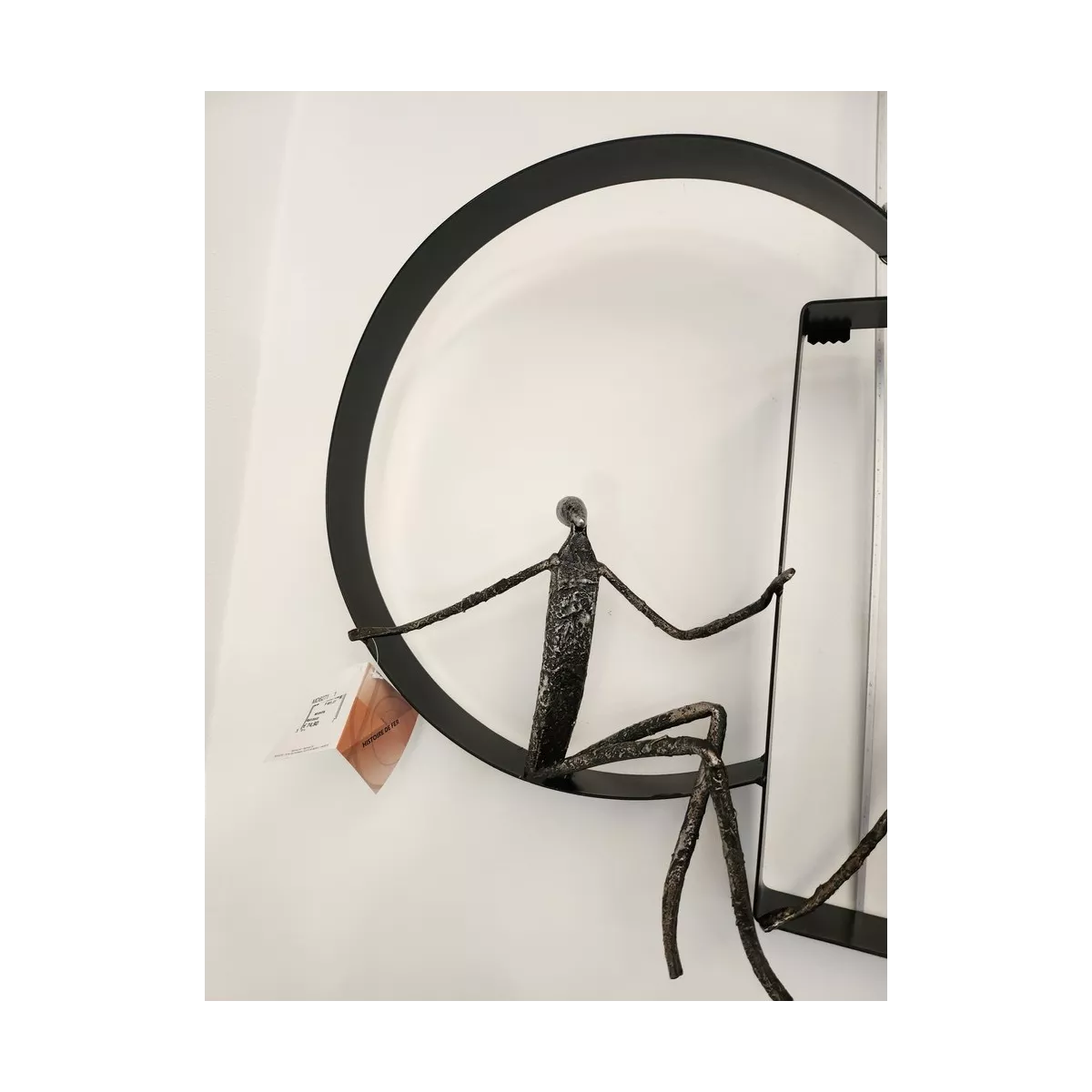 Sculpture murale 2 personnages en aluminuim dans cercles