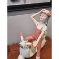Statue Fille sur  Scooter h50cm