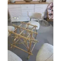 Table en rotin Mikado et verre 120cm