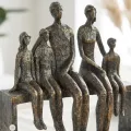 Sculpture Famille sur un banc