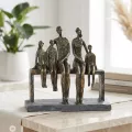 Sculpture Famille sur un banc